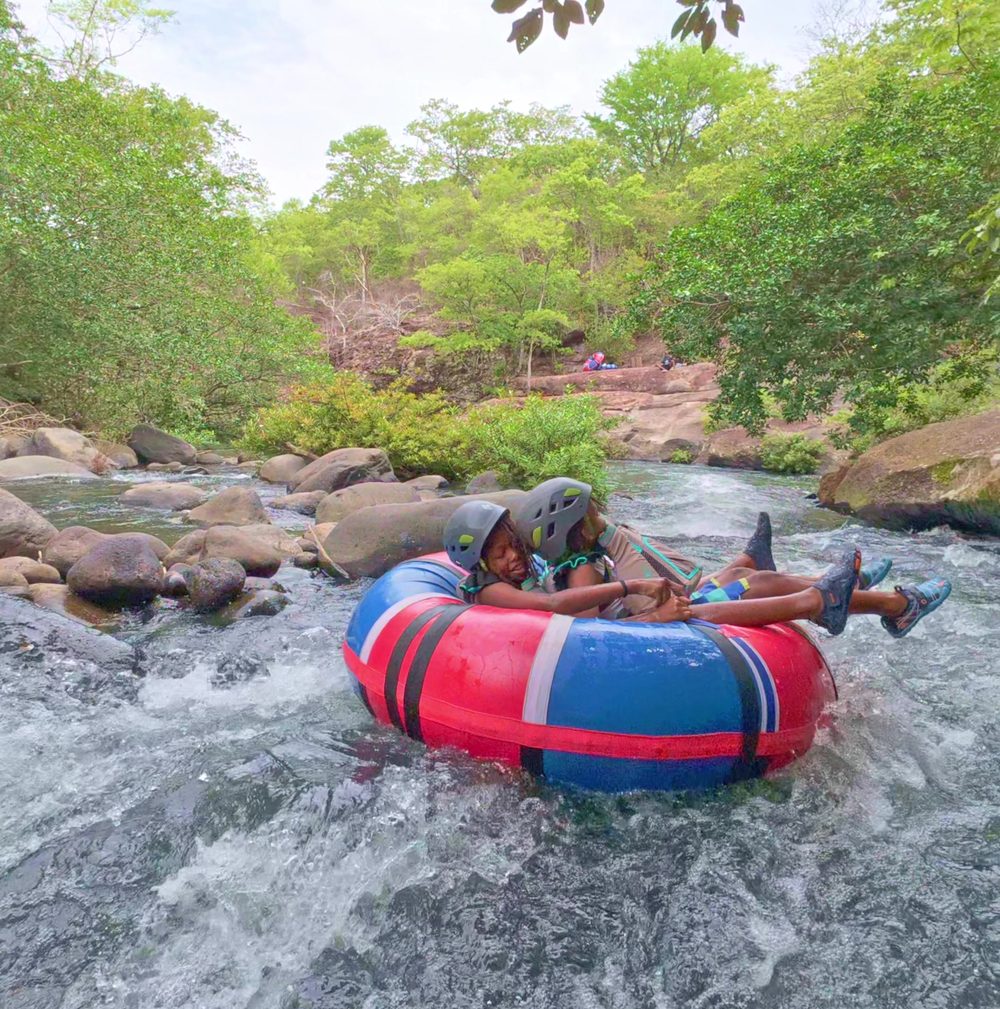 Tubing the river rapids